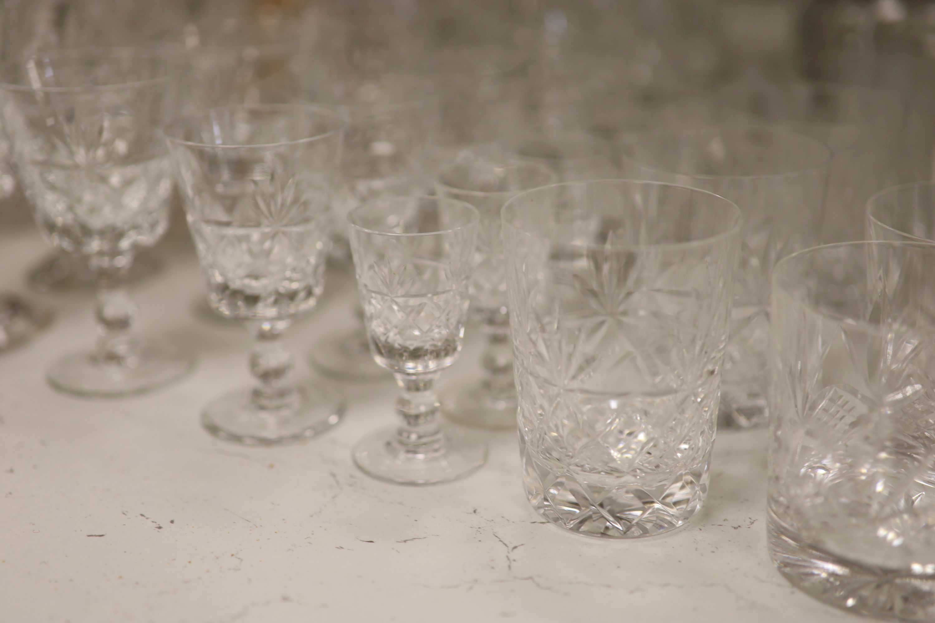 A Brierley cut glass decanter and stopper and a part suite of Brierley 'Bruce' pattern table glass,